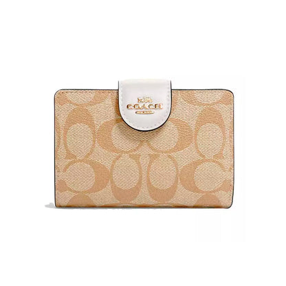Billetera Corner Zip Signature canvas Coach