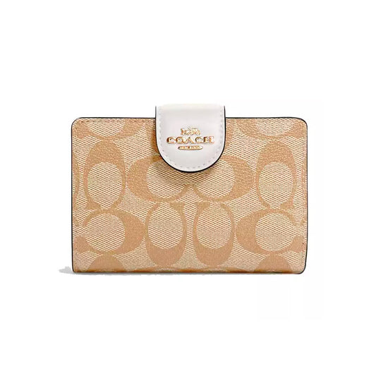 Billetera Corner Zip Signature canvas Coach